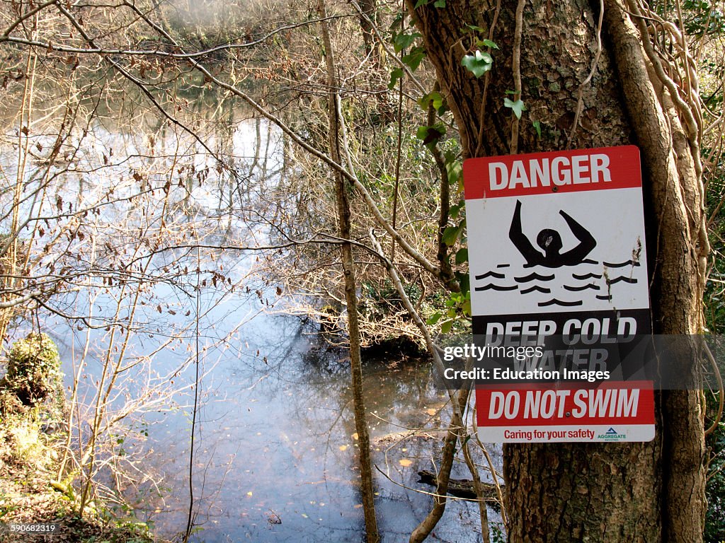 Danger deep cold water do not swim sign