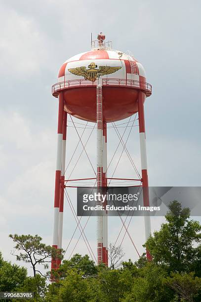 Water tower with the insignia of Naval Air Station Pensacola Florida USA.