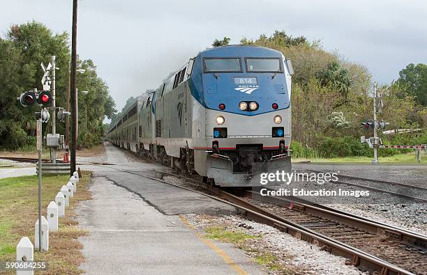 Amtrak Auto Train transporting passengers and their cars, operates daily between Sanford Florida and Washington DC .