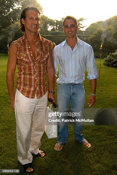 Mark Warfel and Louis Coraggio attend HAMPTON SUN Cocktail Party by the Pool at Nina Griscom Residence on July 15, 2005 in Southampton, NY.