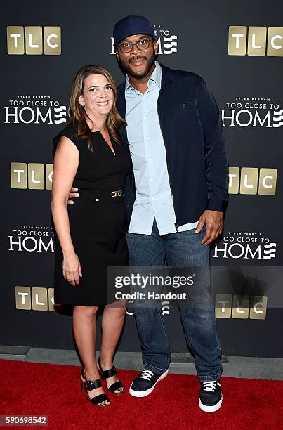 In this handout photo provided by Discovery, President & GM, TLC, Nancy Daniels and creator and producer Tyler Perry attend TLC "Too Close To Home"...