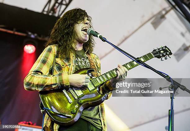 Guitarist and vocalist Thomas Erak of American hard rock group The Fall Of Troy performing live on stage at ArcTanGent Festival in Somerset, on...