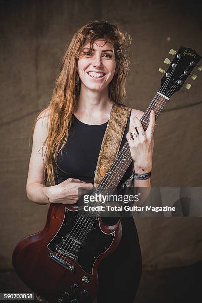 Portrait of American musician Emma Ruth Rundle, guitarist and vocalist with alternative rock group Marriages, photographed backstage at ArcTanGent...