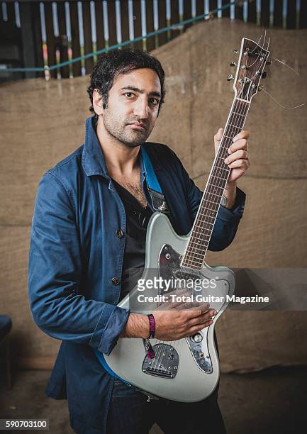 Portrait of American musician Shiv Mehra guitarist with black metal group Deafheaven, photographed backstage at ArcTanGent Festival in Somerset, on...