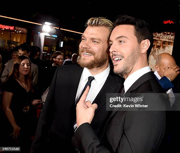 Actors Pilou Asbaek and Jack Huston arrive at the premiere of Paramount Pictures' "Ben-Hur" at the Chinese Theatre on August 16, 2016 in Los Angeles,...