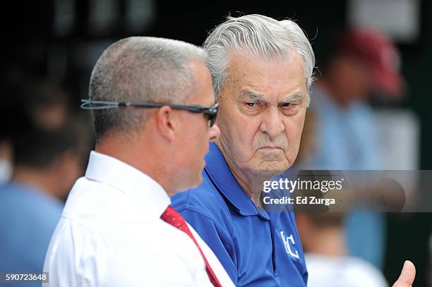Kansas City Royals general manager Dayton Moore and owner David Glass talk during batting practice prior to a game against the Chicago White Sox at...