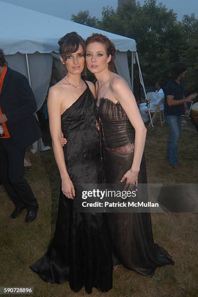 Models Wearing Junko Yoshioka attends Junko Yoshioka Presents Her Evening Wear Collection at Peter and Nejma Beard Residence on July 16, 2005 in...