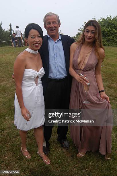 Junko Yoshioka, Peter Beard and Nejma Beard attend Junko Yoshioka Presents Her Evening Wear Collection at Peter and Nejma Beard Residence on July 16,...