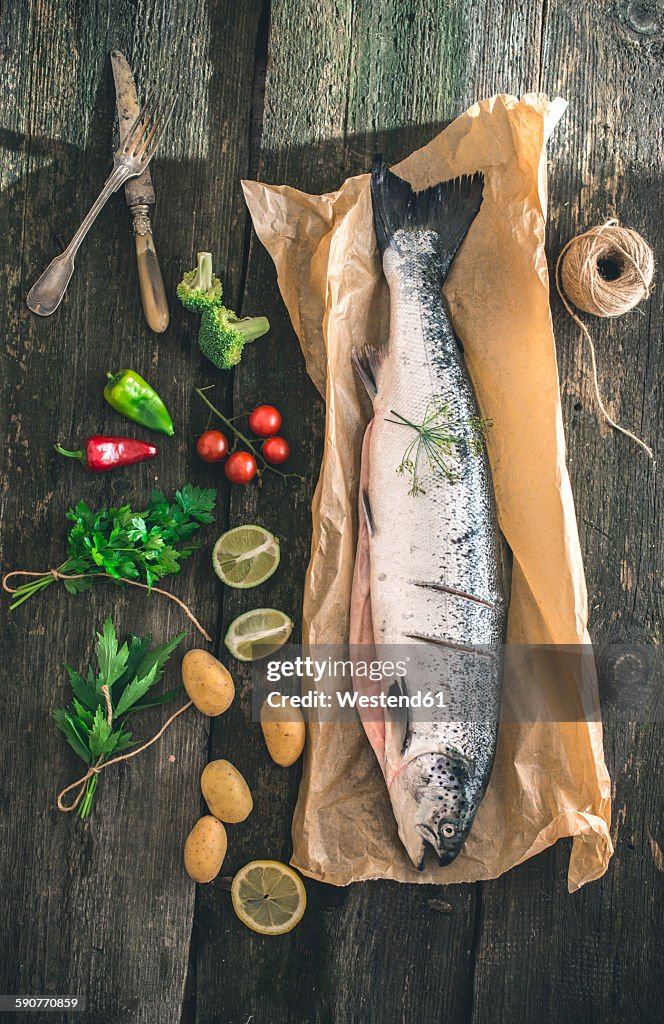 Preparing raw salmon for cooking