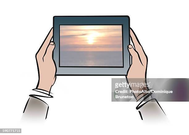illustration of hands holding digital tablet showing tranquil sunset - traumstrand stock-grafiken, -clipart, -cartoons und -symbole