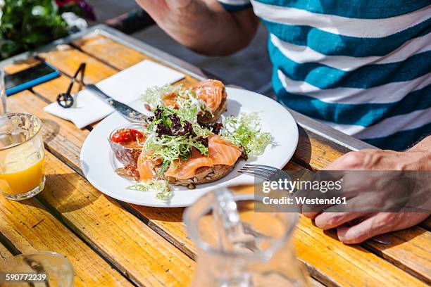 plate with starter at outdoor restaurant - eating seafood stock pictures, royalty-free photos & images