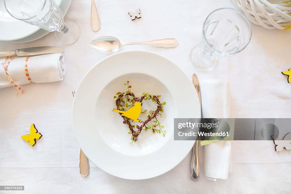 Place setting on laid table at springtime
