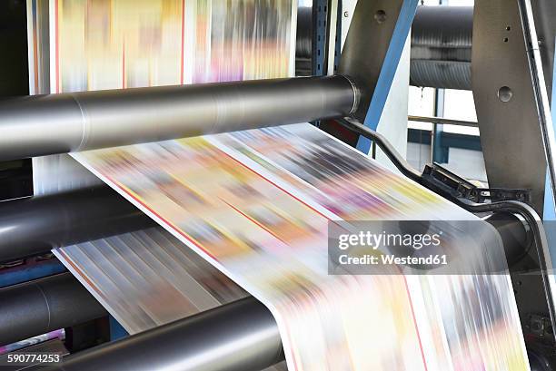 printing machine in a printing shop - printing press stock pictures, royalty-free photos & images