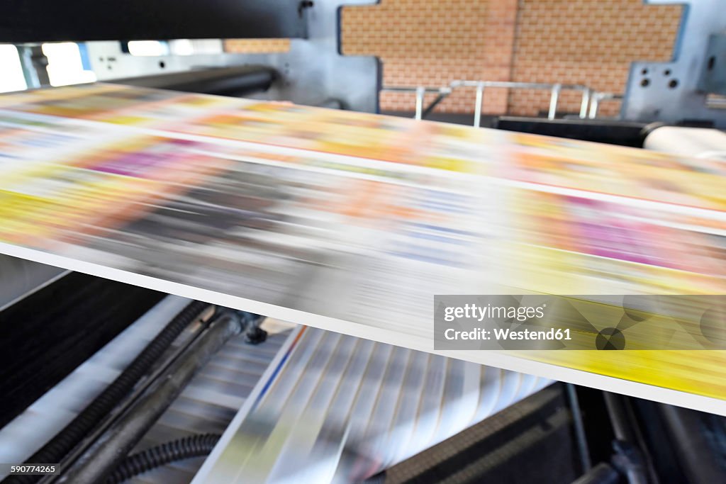 Printing machine in a printing shop