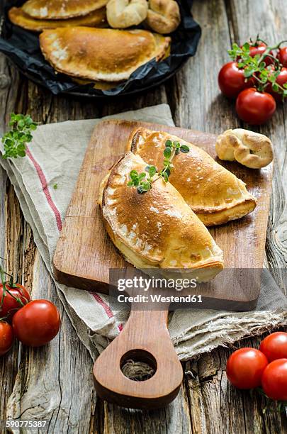calzone stuffed with tomatoes and sage - calzone fotografías e imágenes de stock