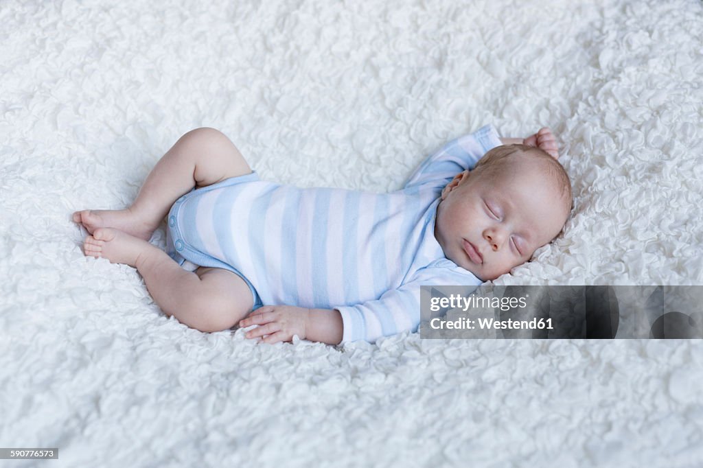 Sleeping newborn baby boy