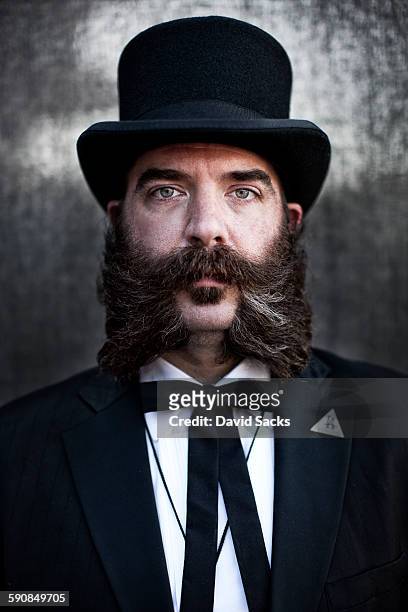 professional beard competitor - シルクハット ストックフォトと画像