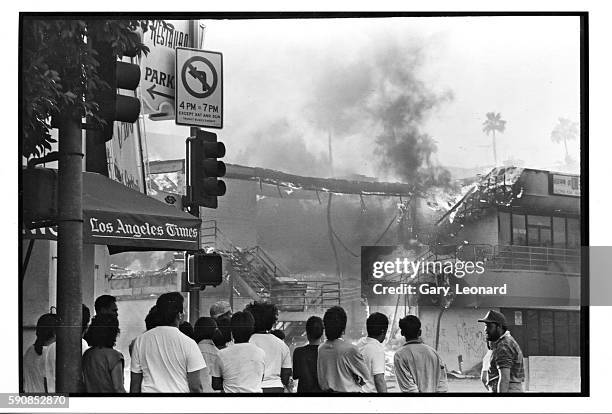 Koreatown spectators watch mini mall burn