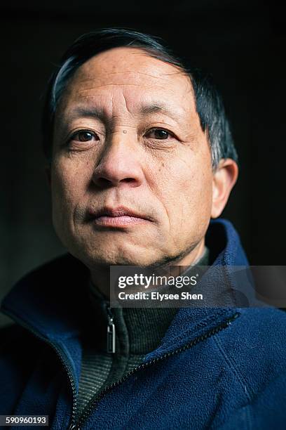 chinese senior adult - portrait black background stock pictures, royalty-free photos & images