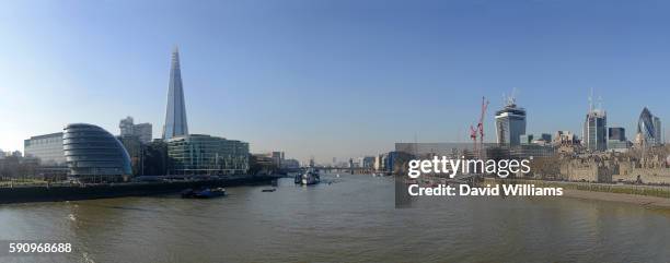 looking west from tower bridge towards the skyline of london. - gherkin shard london stock pictures, royalty-free photos & images