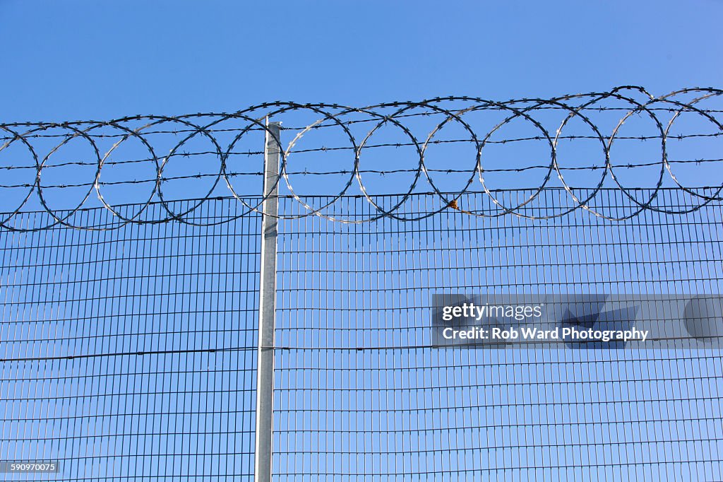Fence Razor Hoops Razor Wire Topped Fence High-Res Stock Photo - Getty Images