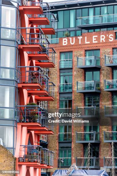 balconies of converted warehouse flats in shad thames, dockland. - shad stock pictures, royalty-free photos & images
