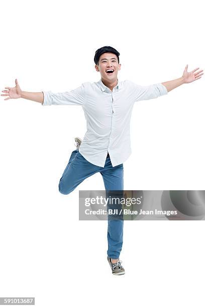 happy young man - rolling up sleeve stock pictures, royalty-free photos & images