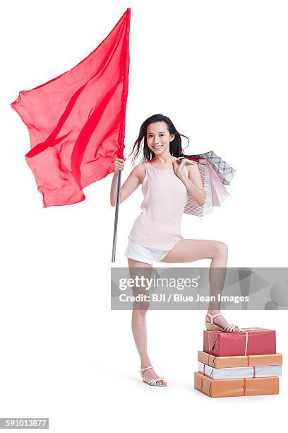 young woman shopping with a red flag - asian flags ストックフォトと画像