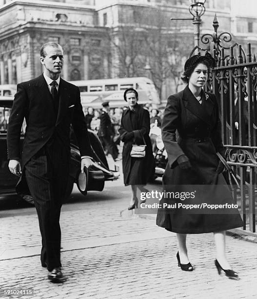 Queen Elizabeth II and Prince Philip, Duke of Edinburgh arrive for the first public engagement of her reign, a Maundy Service at Westminster Abbey,...