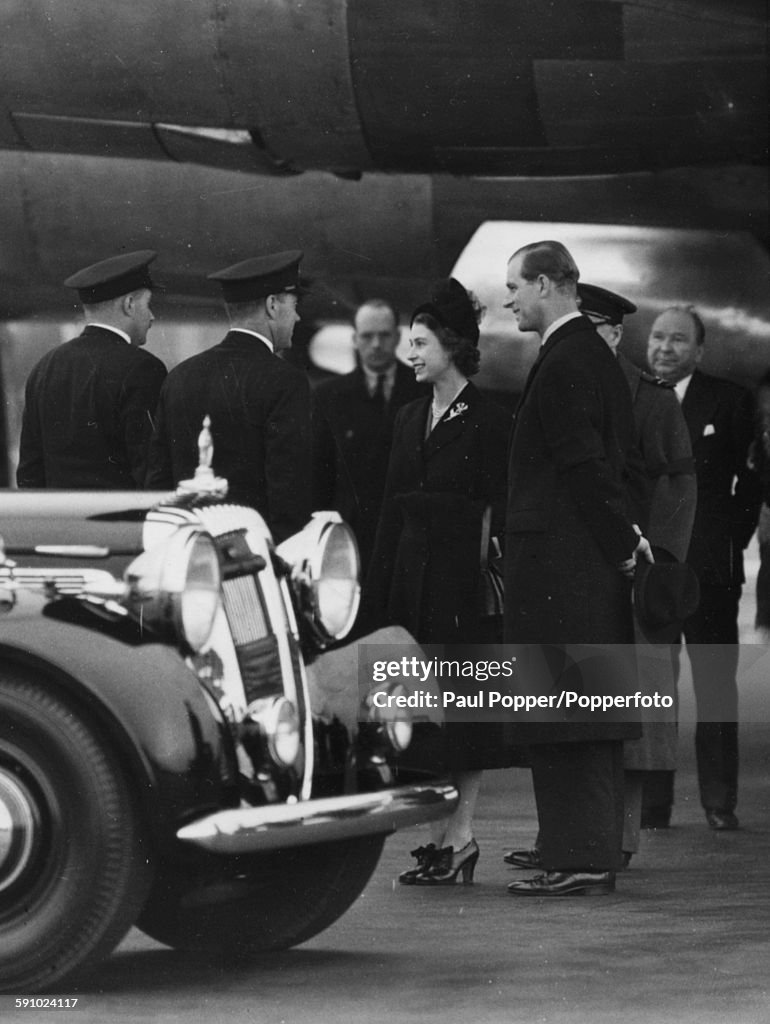 Queen Elizabeth II And Prince Philip Arrive Back In London