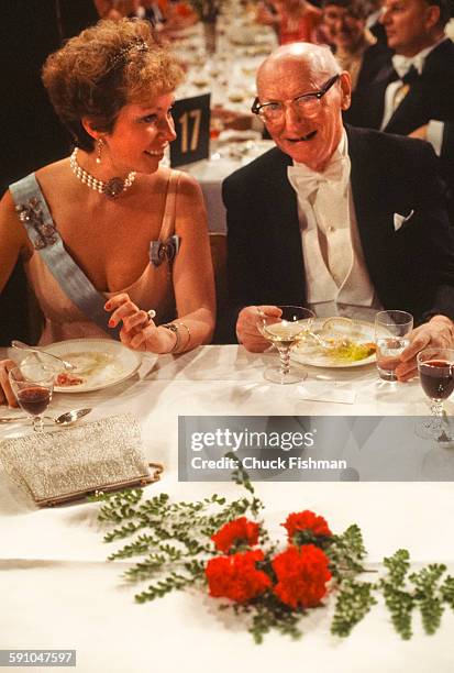 Swedish Princess Christina, Mrs Magnuson shares a laugh with Polish-born American author Isaac Bashevis Singer at the Nobel Prize ceremony banquet,...