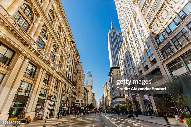 5th avenue with empire state building, new york - fifth avenue stock pictures, royalty-free photos & images