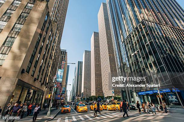 busy street at 6th avenue - sixth avenue stock pictures, royalty-free photos & images