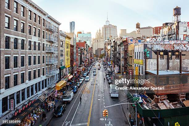 high angle view of chinatown from manhattan bridge - lower east side manhattan stock pictures, royalty-free photos & images