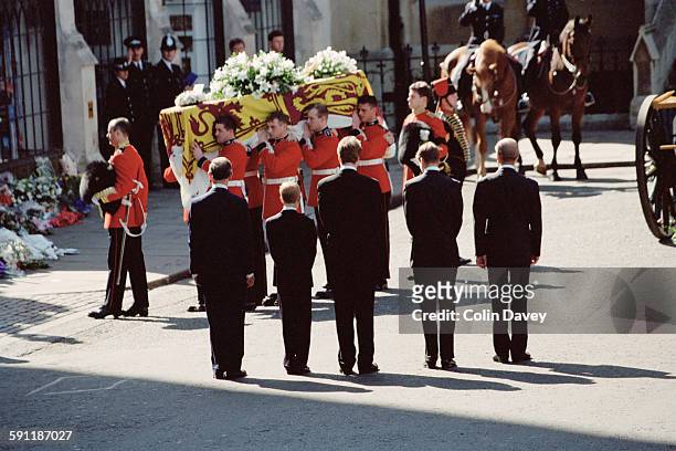 The funeral of Diana, Princess of Wales at Westminster Abbey in London, 6th September 1997. From left to right, Prince Charles, Prince Harry, Earl...