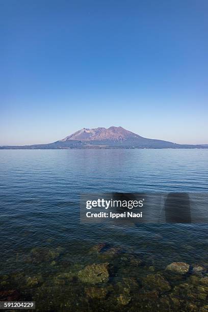 mt. sakurajima and kagoshima bay, japan - mt sakurajima stock pictures, royalty-free photos & images