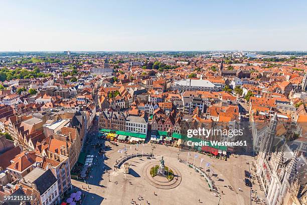 belgium, flanders, bruges, city view and grote markt - bruges stockfoto's en -beelden