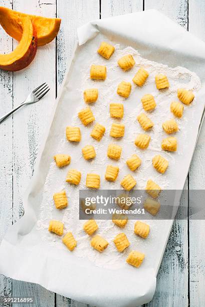 preparing pumpkin gnocchi - lebensmittel rechteck stock-fotos und bilder