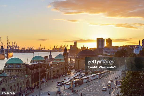 germany, hamburg, port of hamburg and st. pauli landing stages at sunset - hamburger hafen stock-fotos und bilder