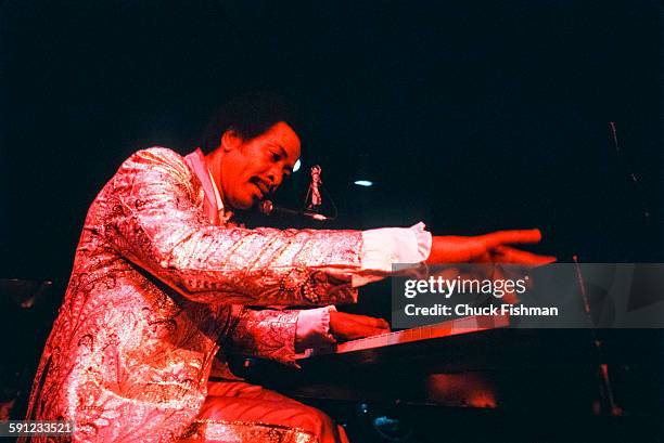 American Jazz musician Allen Toussaint plays piano as he performs onstage during the New Orleans Jazz Festival, New Orleans, Louisiana, 1981.