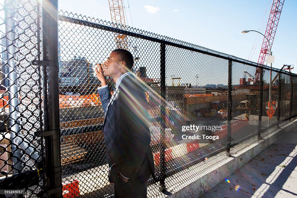 Businessman looking at construction site