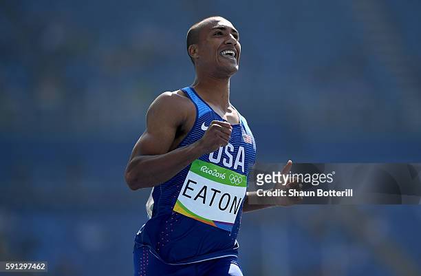 Ashton Eaton of the United States reacts during the Men's Decathlon 100m heats on Day 12 of the Rio 2016 Olympic Games at the Olympic Stadium on...