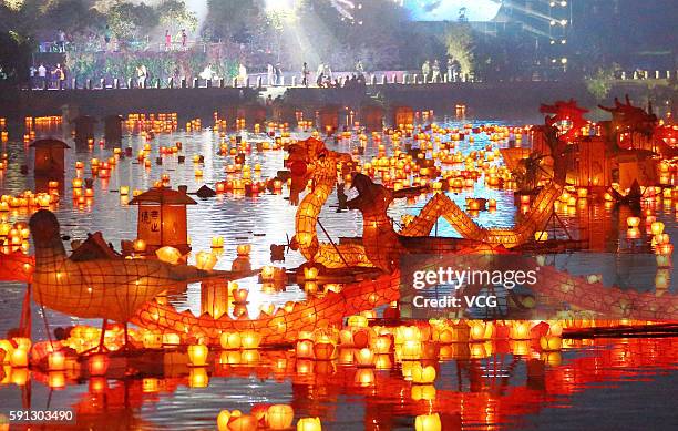River lanterns are put in river by local people to pray for favorable weather and peaceful and prosperous country in night before the Ghost Festival...