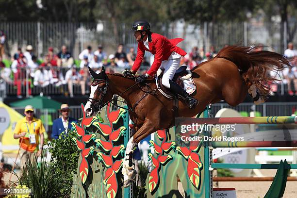 Jerome Guery of Belgium rides Grand Cru Van De Roz during the Individual Jumping 3rd Qualifier during Day 12 of the Rio 2016 Olympic Games at the...