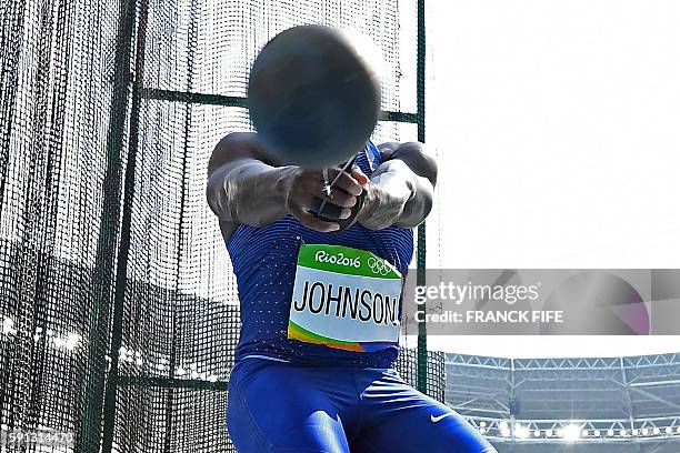 S Kibwe Johnson competes in the Men's Hammer Throw Qualifying Round during the athletics event at the Rio 2016 Olympic Games at the Olympic Stadium...