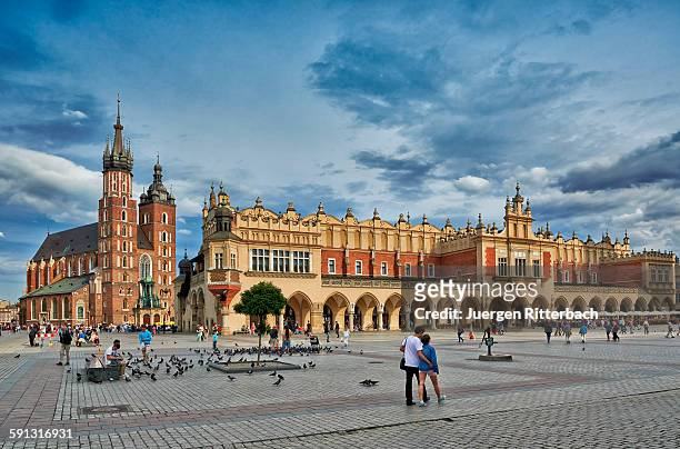 cloth hall and st. mary's basilica - krakow stock pictures, royalty-free photos & images