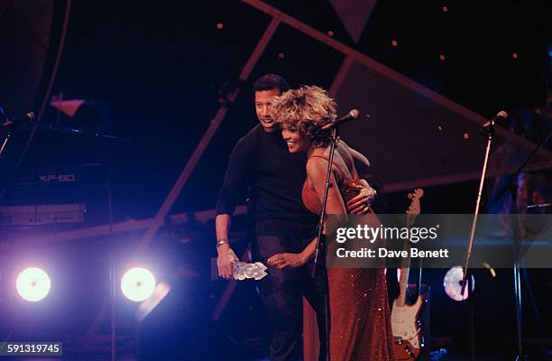 American singers Lionel Richie and Tina Turner during the MOBO Awards at the Royal Albert Hall in London, 6th October 1999.