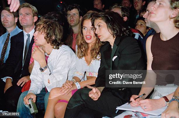 English jewelry designer Jade Jagger with her mother Bianca Jagger and fashion designer Daniel Macmillan at a Julien MacDonald fashion show at the...