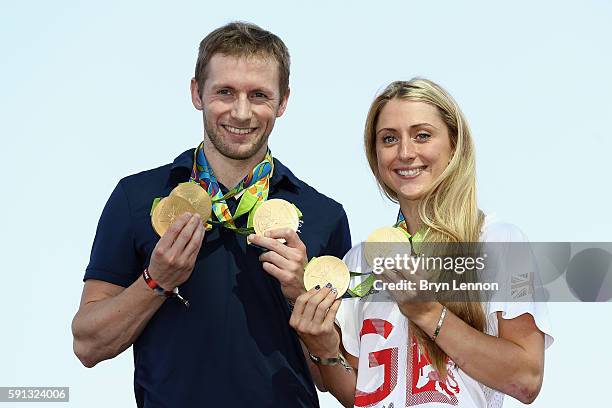 Team GB cyclists Laura Trott and Jason Kenny pose with their gold medals at Adidas House on August 17, 2016 in Rio de Janeiro, Brazil.