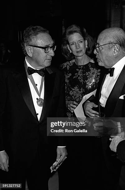 Henry Kissinger, Nancy Kissinger and Ahmet Ertegun attend A Decade of Literary Lions Benefit Gala on November 8, 1990 at the New York Public Library...